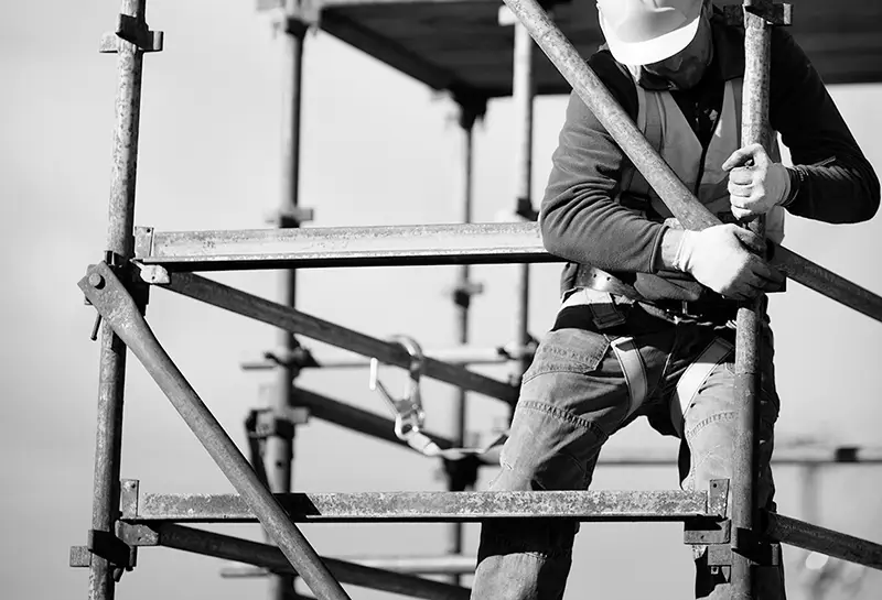 Construction worker in scaffolding