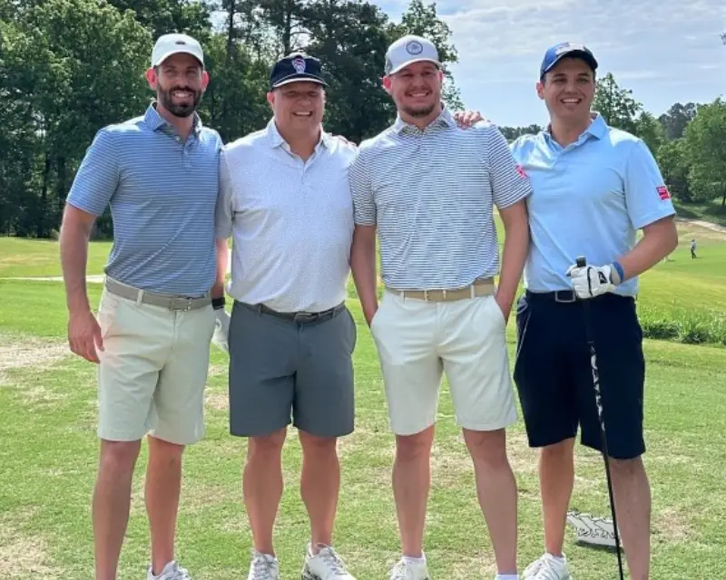 Group of 4 men on golf course