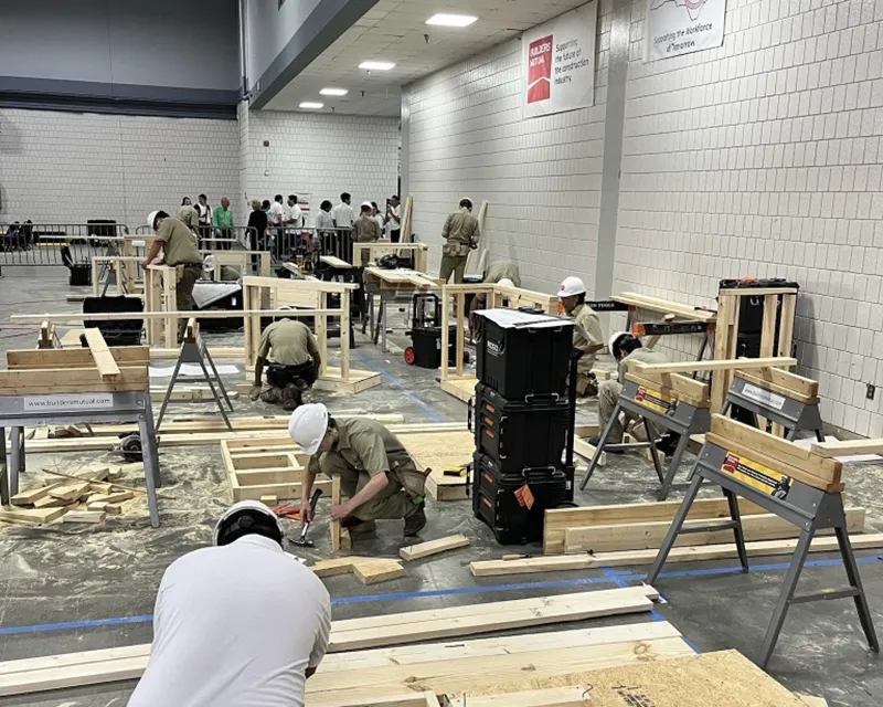 Students learning construction skills