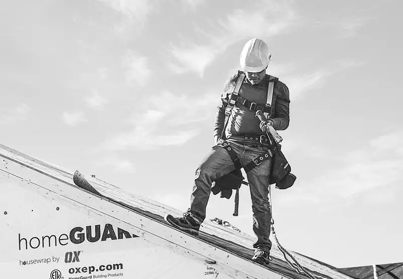 Man on roof at job-site